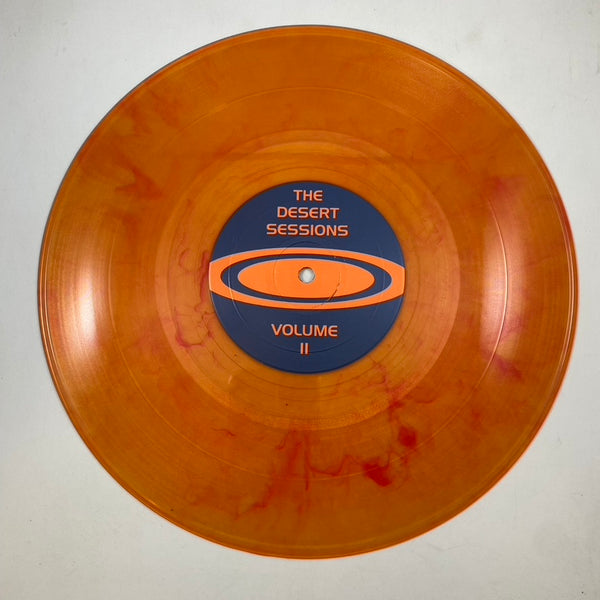 The Desert Sessions – Vol II. Status: Ships Commander Butchered 10" USED Vinyl NM/NM Color Vinyl